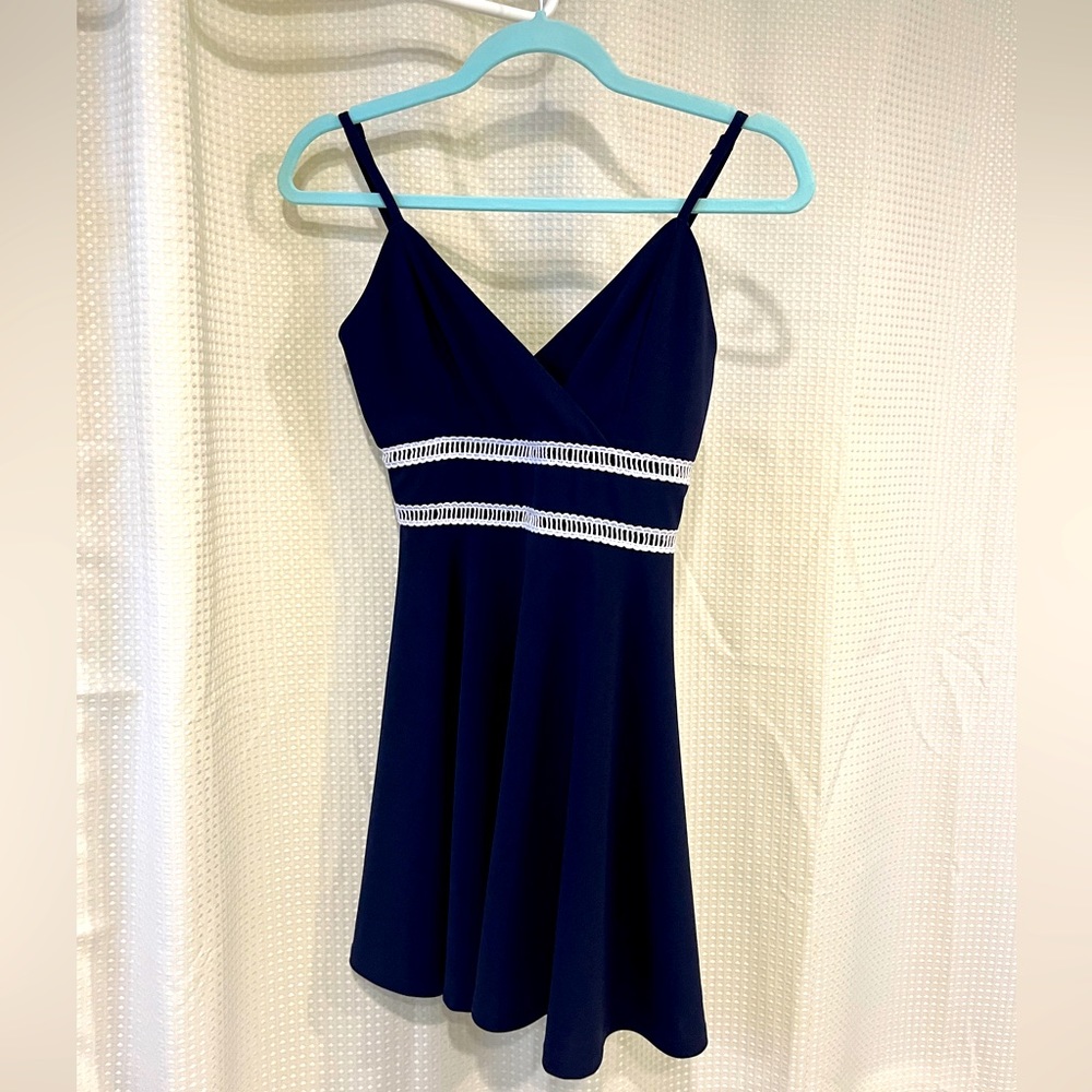 Francesca’s Navy Sleeveless Dress with White Trim